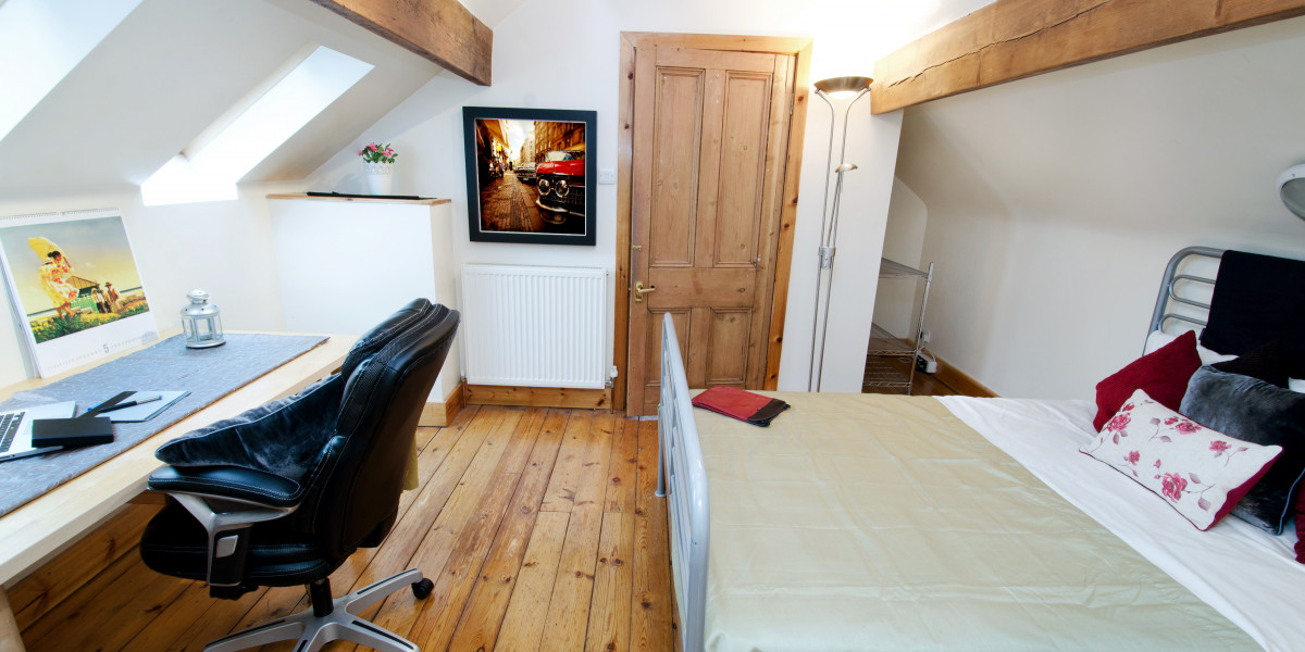 Bedroom 3 has its own study area and double bed