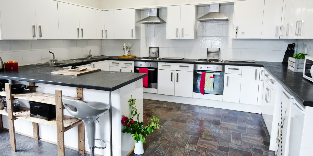 Large Kitchen; 2 Ovens, 2 sinks, dishwasher, fridge and cupboard each