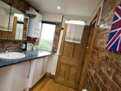 Bathroom sink and vanity counter in The Stables - Thumbnail