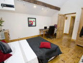 Spacious double bedroom in The Stables - Thumbnail