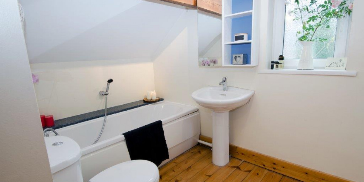 Bath and shower in The Stables.